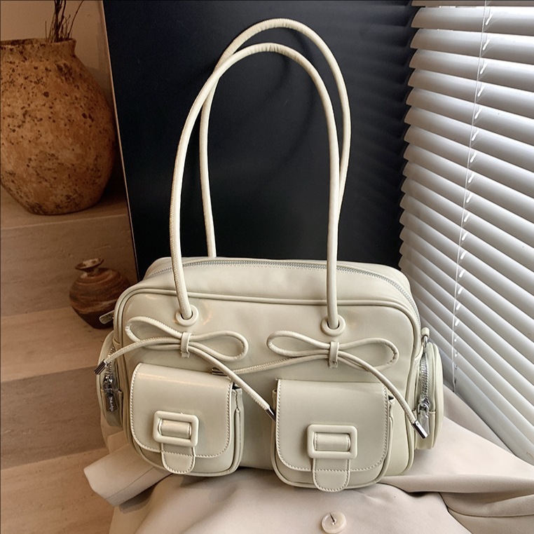 Korean version bow underarm bag for women 2025 new style stylish commuting single-shoulder bag, niche design double-pocket pillow bag full figure