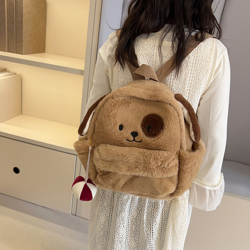 A new cartoon color-blocking plush dog backpack with large capacity, cute and soft girl plush bag, and a small backpack for children's classes Application Scenario