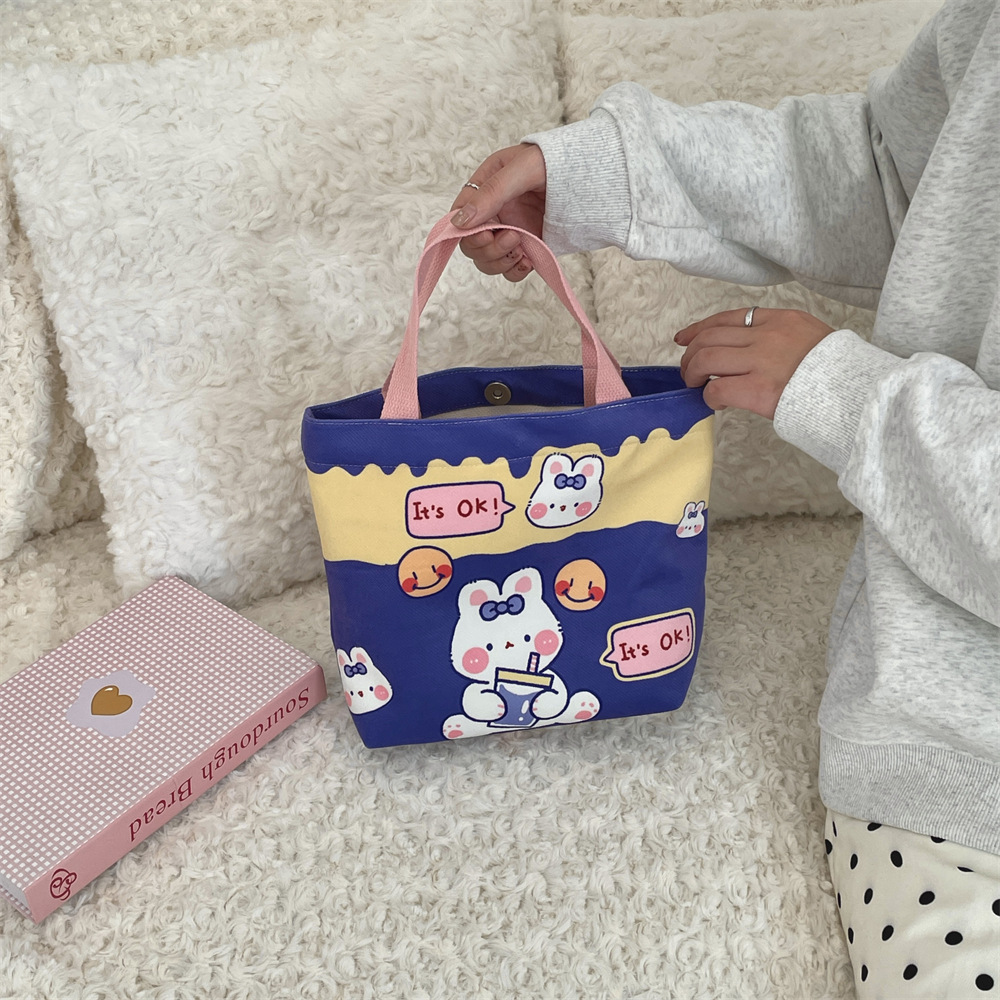 41223 Cute cartoon printed handbag for women, Korean version, large-capacity canvas shopping bag, hand-held lunch bag for work Specification drawing