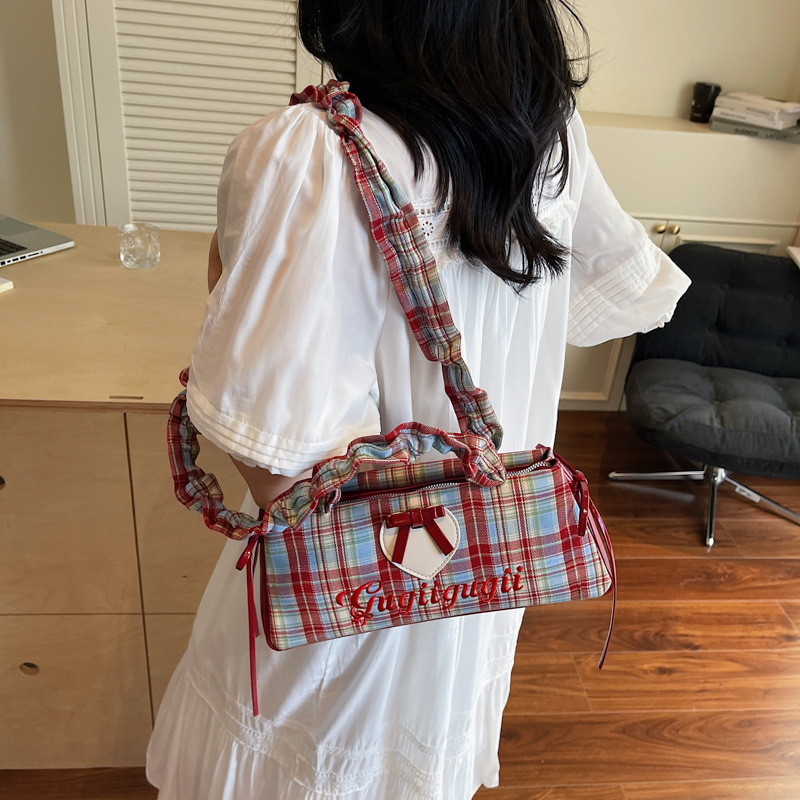 Korean sweet bow underarm bag, hand-held women's bag, 2025 summer new baguette bag, casual single-shoulder bag details Picture