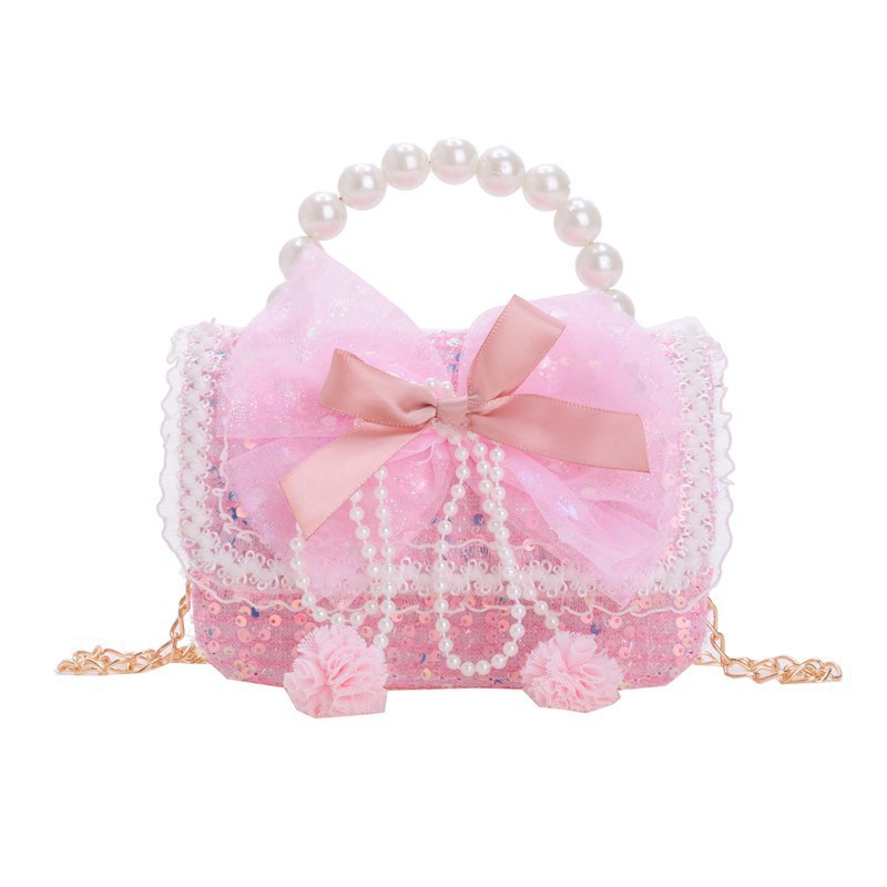 Autumn and winter Korean version bow camellia children's bag Pearl hand-held lace trim kindergarten girl crossbody bag Item Picture