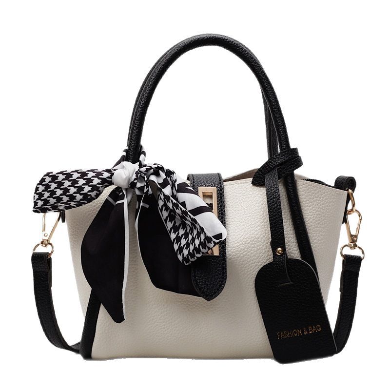 2025 New retro, light luxury, simple and large-capacity hand-held bucket bag for women, high-end texture, single-shoulder crossbody bag for mother and child Item Picture