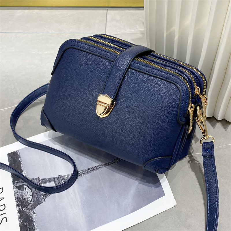2023 New solid-color multi-layer spliced soft leather large-capacity single-shoulder crossbody simple cross-border women's small bag Item Picture