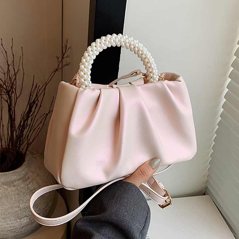 The handbag Lady 2024 Niche design Pearlescent new high-end pleated cloud bag pearl hand-held shoulder crossbody bag full figure