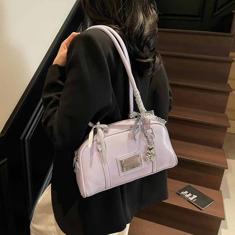 Trendy and versatile hand-held bowling bag for women 2025 New Korean version solid color casual and simple single-shoulder armpit bag details Picture