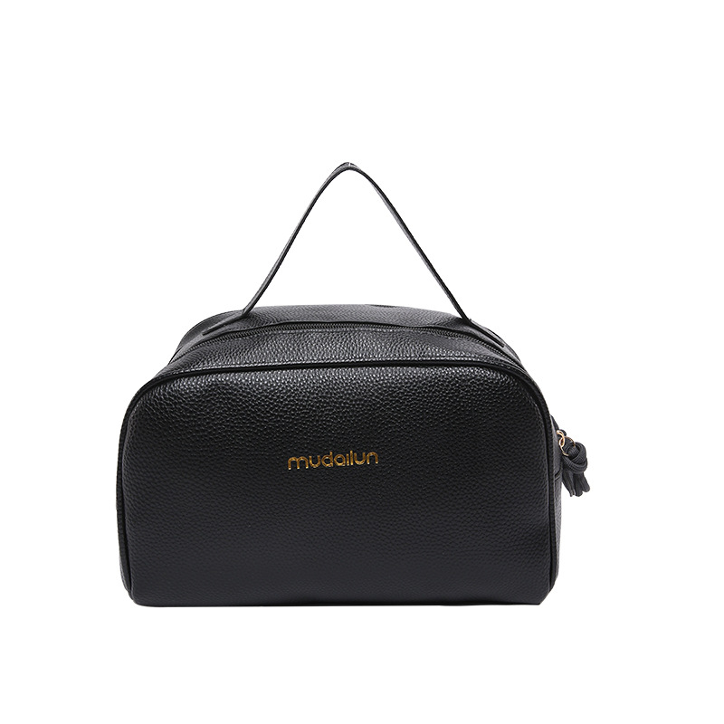 This is a new stylish Korean-style handbag for the autumn of 2024, featuring a retro, simple and elegant texture. It is a casual and commuting hand-held pillow bag Item Picture