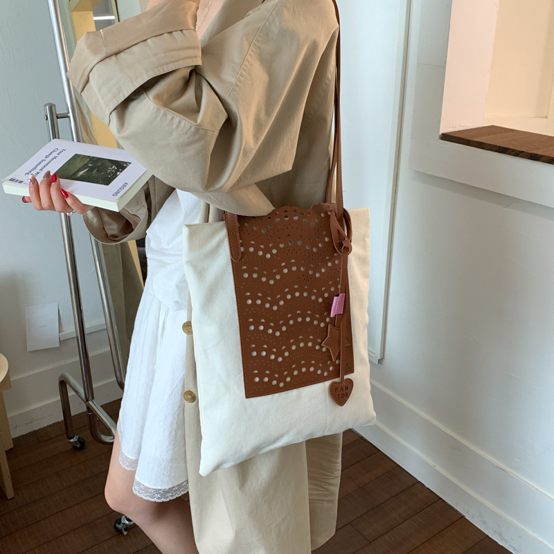 Summer fashion large-capacity canvas bag for women, 2025 new style hollowed-out underarm bag, versatile single-shoulder tote bag details Picture