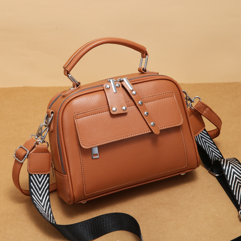 The 2024 new Korean-style solid color multi-pocket double-shoulder strap small square bag is a practical and elegant lady's commuting handbag Application Scenario