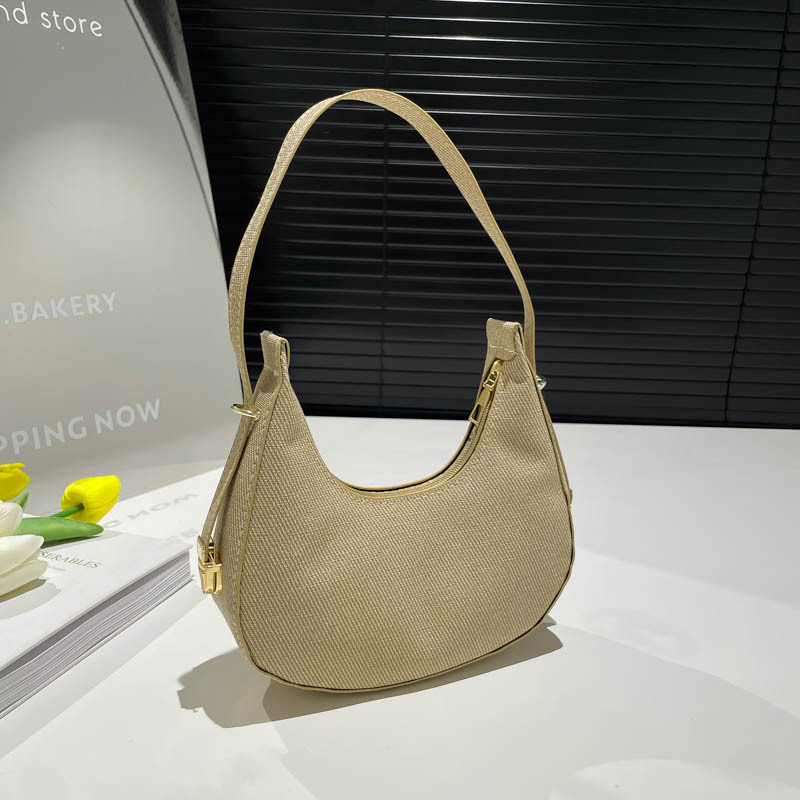 Retro underarm casual bag for women 2025 new spring style, stylish and solid color stone pattern single-shoulder hand-held dumpling bag full figure