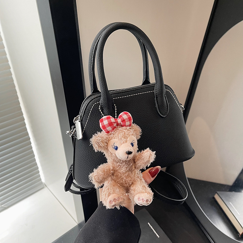 A high-end hand-held shell bag for women 2024, a trendy and versatile single-shoulder bag with a niche design and a simple crossbody details Picture