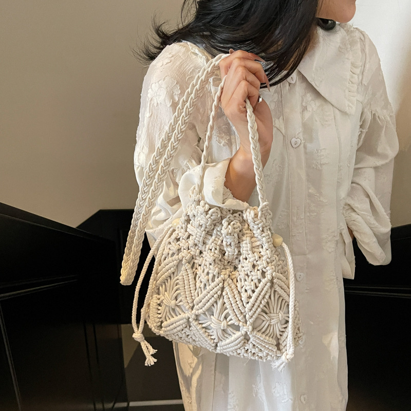 Woven cotton rope bag for women's summer, 2025 new fashion and niche design, crossbody bucket bag, hollowed-out beach bag details Picture