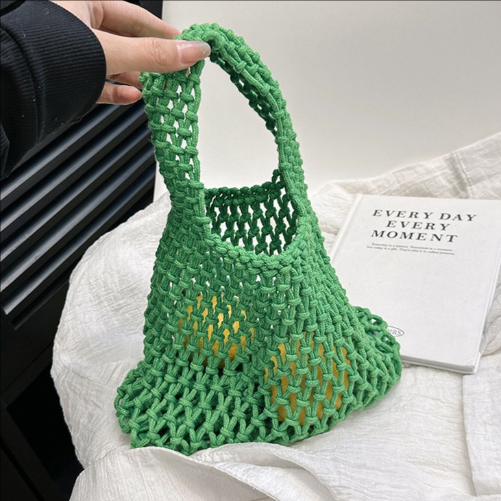 Korean-style niche hollowed-out mesh clutch, hand-woven wrist bag, fashionable and versatile, trendy beach vacation handbag full figure