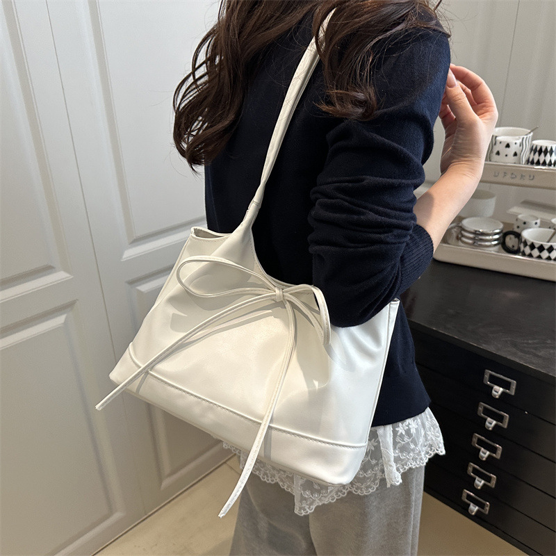 Sweet bow single-shoulder bag 2025 new style, stylish texture soft leather tote bag, large-capacity commuting underarm bag details Picture