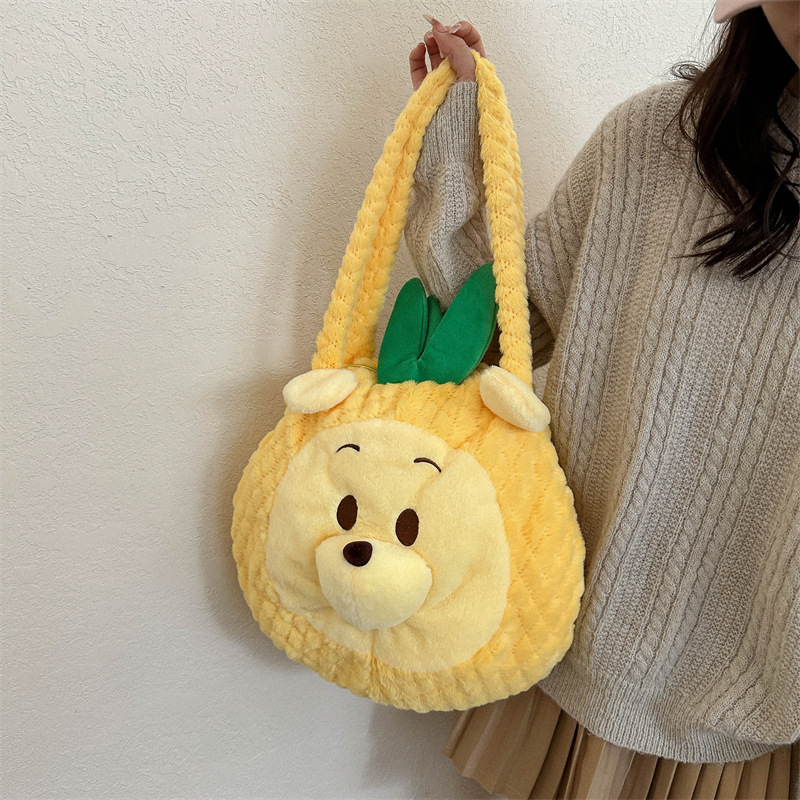 A new 2024 Japanese large-capacity cartoon pineapple bear handbag, a sweet and fluffy single-shoulder bag for students' classes full figure