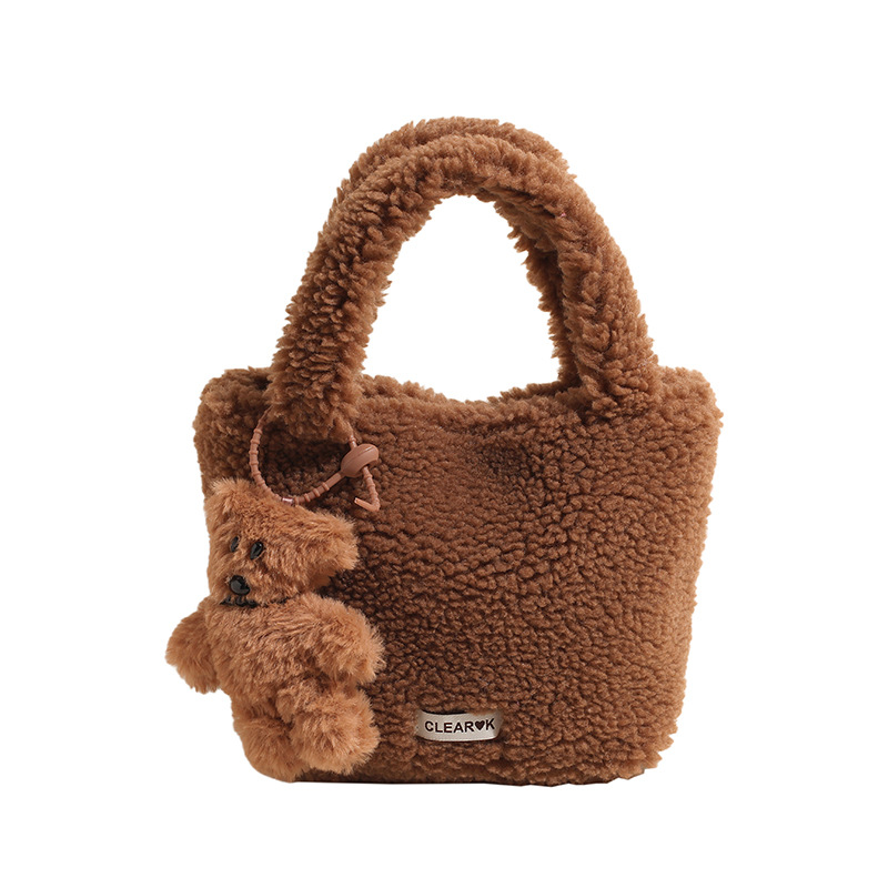A fluffy hand-held bag for ladies in 2024, a trendy Maillard single-shoulder bag for commuting and casual use, a crossbody bucket bag Item Picture