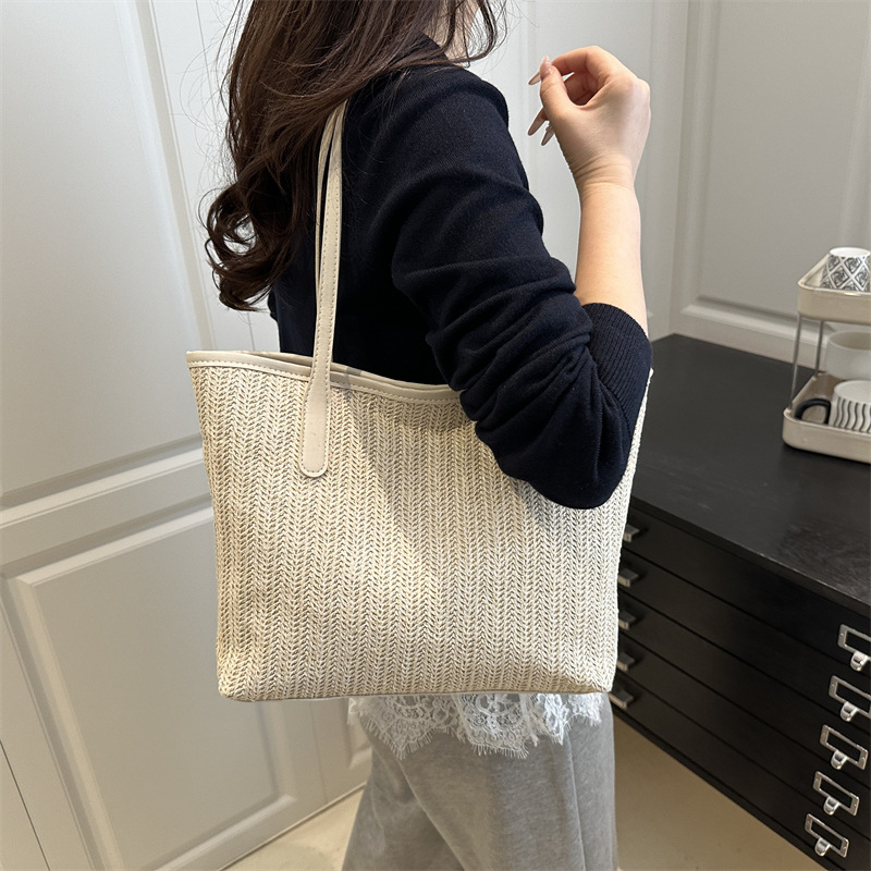 INS casual single-shoulder straw woven bag, new large-capacity hand-held woven bag, tote bag, women's beach vacation bag details Picture