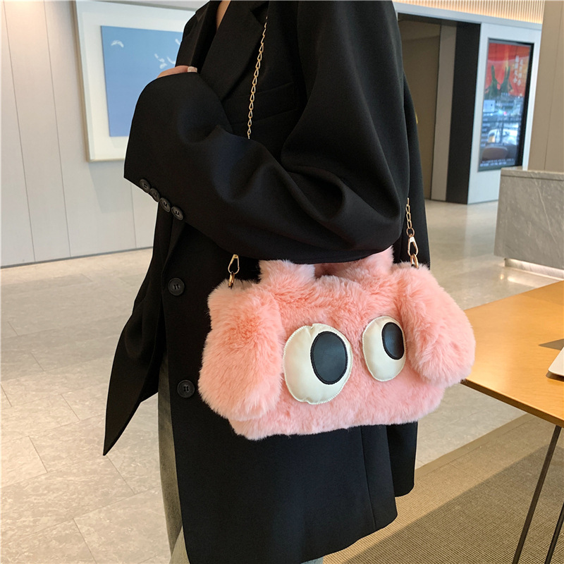 Cute cartoon multi-color handbag for girls, new autumn and winter style, with big eyes, a funny little dog and a fluffy plush bag details Picture