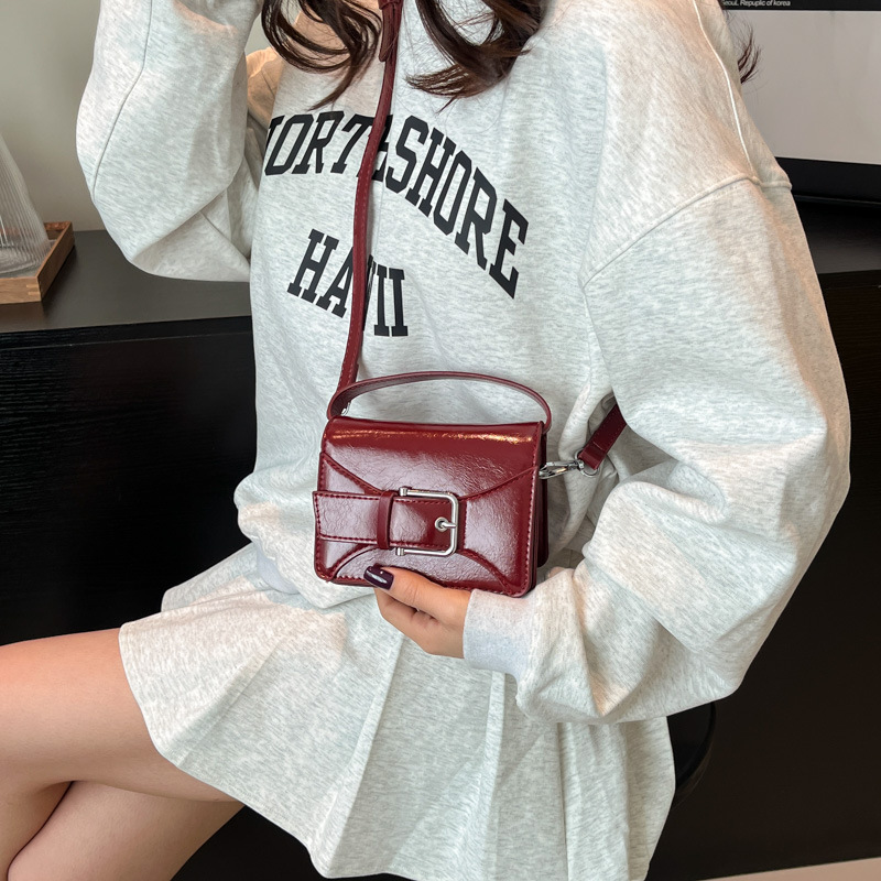 Korean solid color simple and niche belt mini hand-held square bag for women 2025 summer new style cute little wallet details Picture