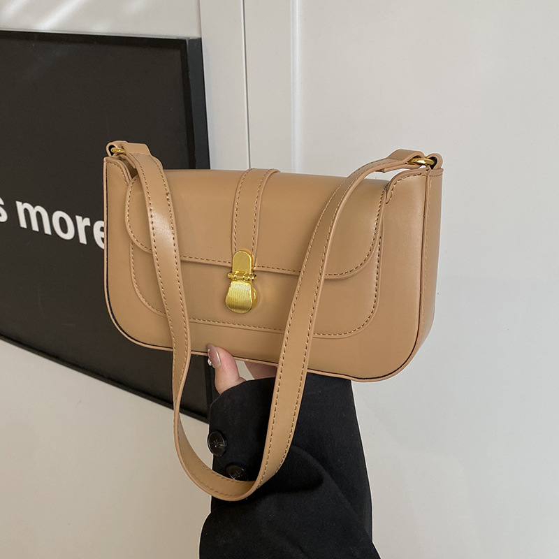2025 New single-shoulder niche design fashionable women's bag, high-quality commuting handbag, crossbody bag, elegant small bag full figure