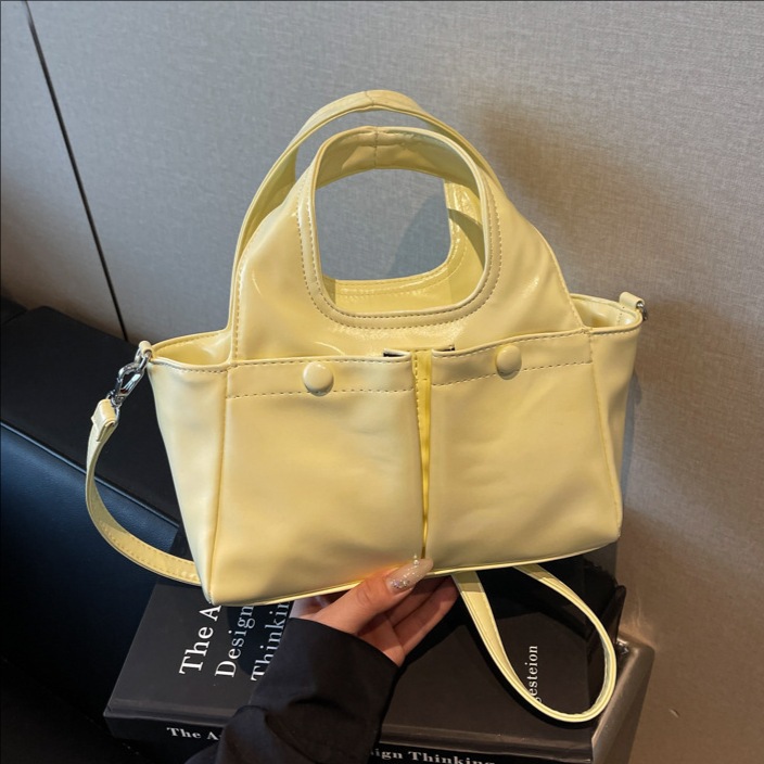 Retro and fashionable soft leather hand-held bucket bag for women, a new summer 2025 trendy and versatile single-shoulder crossbody bag for commuting and casual wear full figure