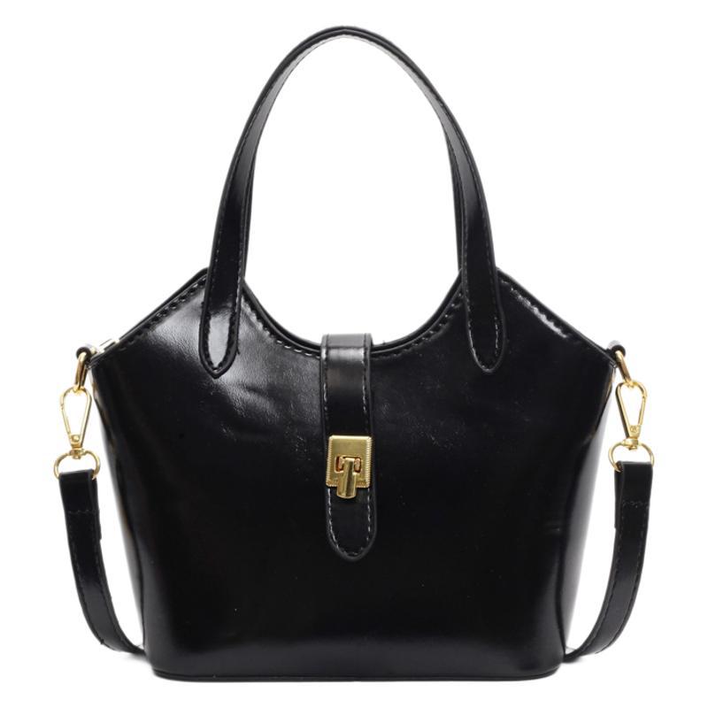 Korean pure color large-capacity hand-held bucket bag for women 2025 new style, versatile and simple crossbody bag, casual commuting single-shoulder bag Item Picture