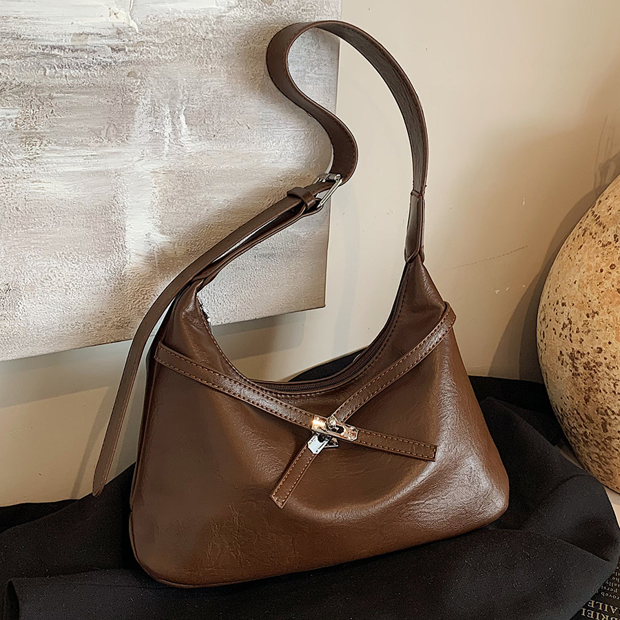 This year's trendy bags for women are the 2024 new retro and niche design single-shoulder underarm bag and casual dumpling bag full figure