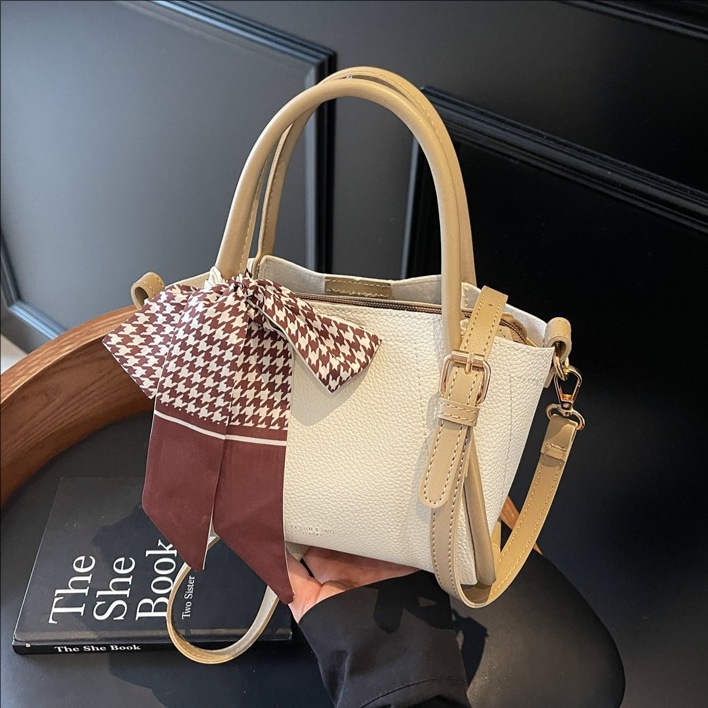 High-end lychee pattern bucket bag for women, 2025 new trendy and versatile crossbody bag, casual hand-carry mother and child bucket bag full figure