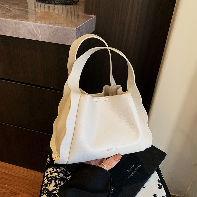 Hand-held fashionable bucket bag for women 2025 new style simple and versatile single-shoulder bag, Korean style niche high-end casual women's bag details Picture