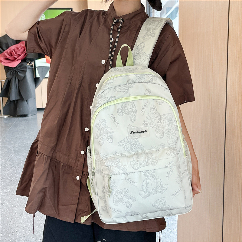 A new, stylish, lightweight, large-capacity, cool and casual backpack for junior and senior high school students, and a sweet handbag Specification drawing