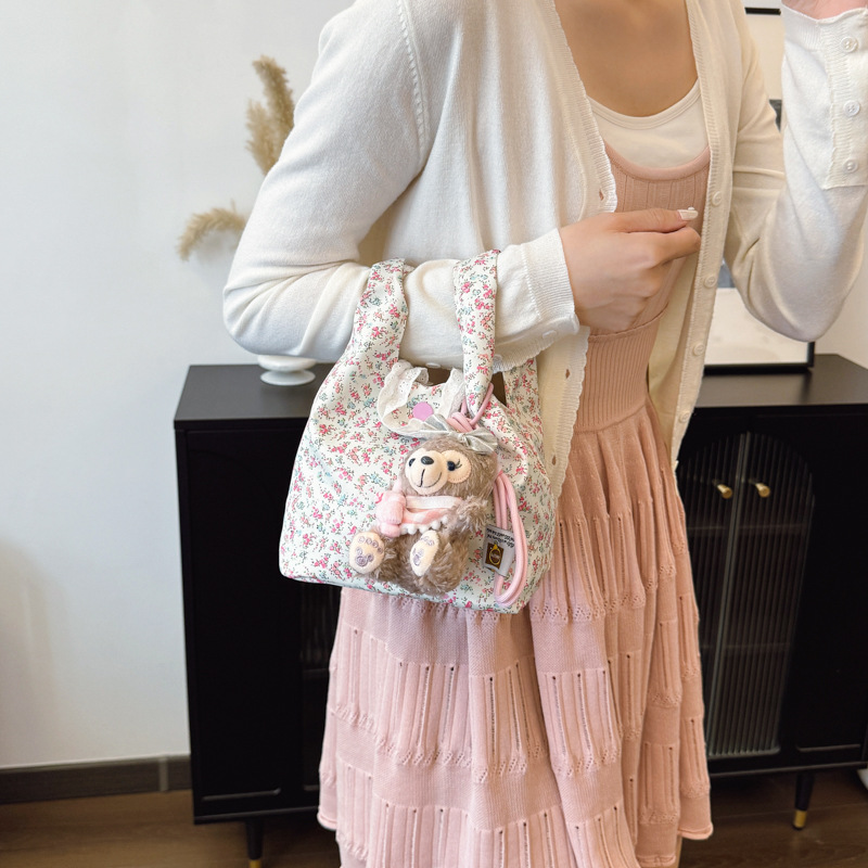 Korean large-capacity floral bag for women, 2025 new pleated cloud bag, a niche dual-purpose tote commuter crossbody bag details Picture