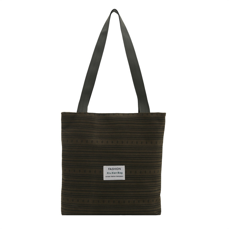 Japanese-style simple single-shoulder canvas bag 2025 new style fashionable striped hand-held single-shoulder bag for class tote commuting Item Picture