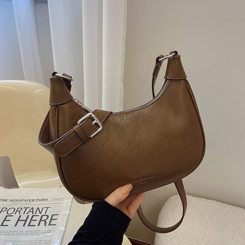 A niche design soft-skin dumpling bag for women, 2024 new retro large-capacity underarm bag, a high-end single-shoulder crossbody bag full figure