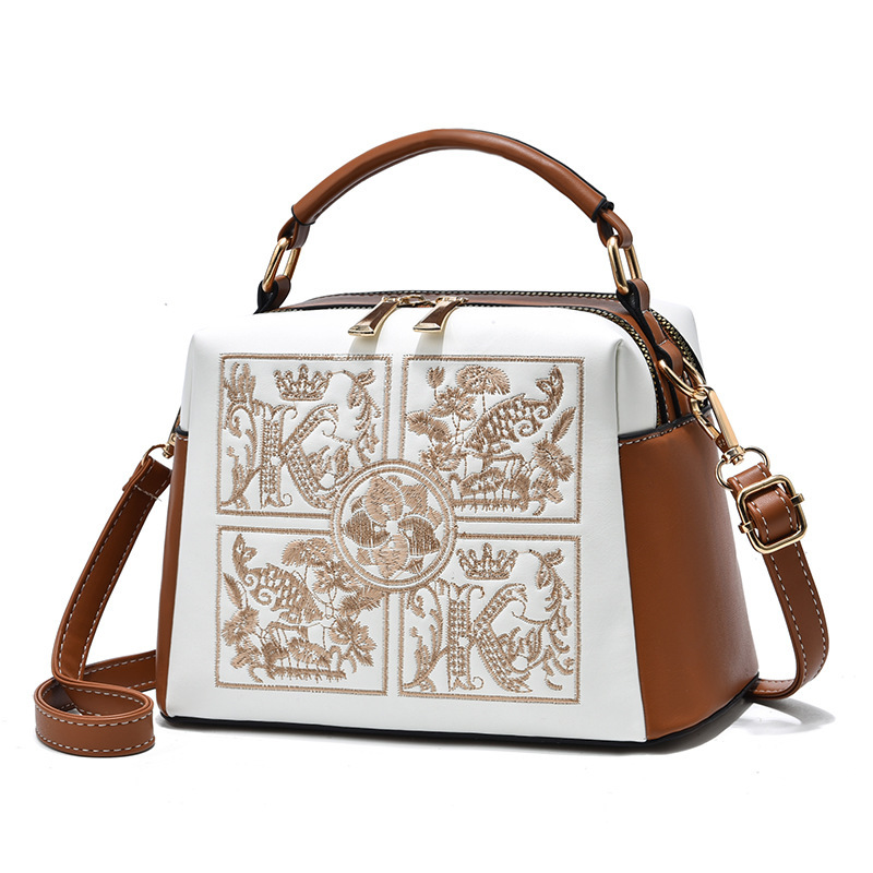 The 2022 new style of fashionable embroidered middle-aged women's handbag is stylish and can be worn diagonally over one shoulder Item Picture