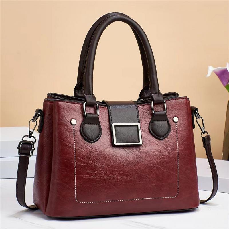 This is a new large-capacity single-shoulder crossbody women's bag for women made of retro material with contrasting colors. It has multiple layers and a high-quality texture Specification drawing