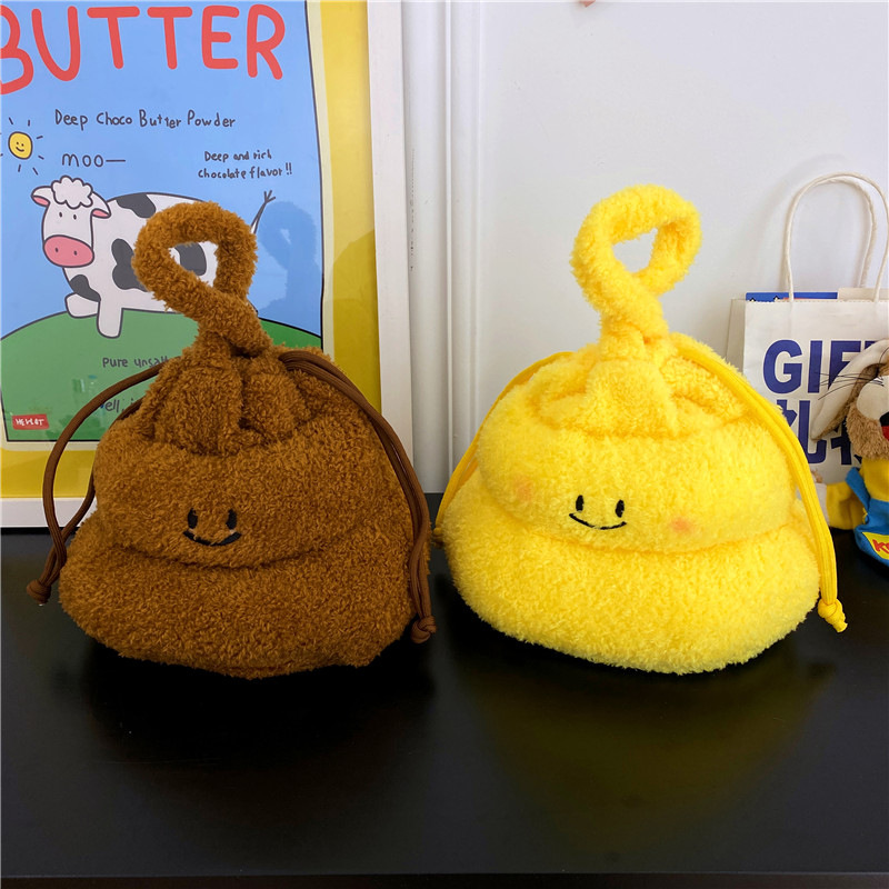 New cartoon creative poop hand-held crossbody bag for girls, cute and funny, niche drawstring single-shoulder bag factory direct sales full figure