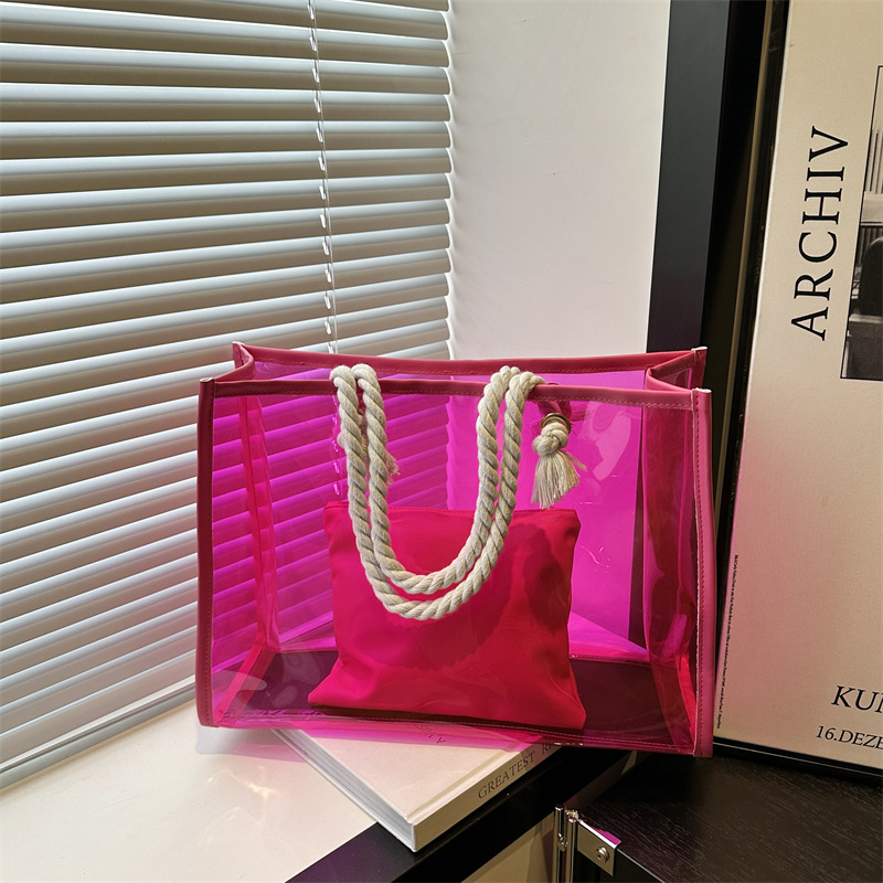 Pink pvc colorful handbag, large-capacity gift shopping bag, transparent waterproof cosmetics, and linen rope hand-held bag full figure