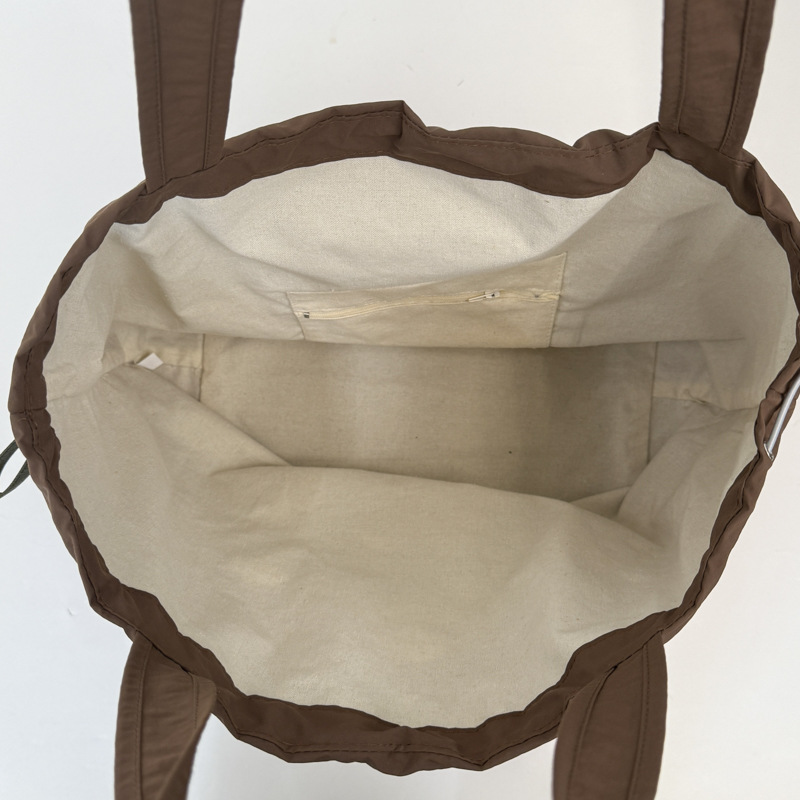 2025 New letch-printed canvas bag, women's large-capacity casual single-shoulder bag, cute printed bucket bag, class bag Item Picture