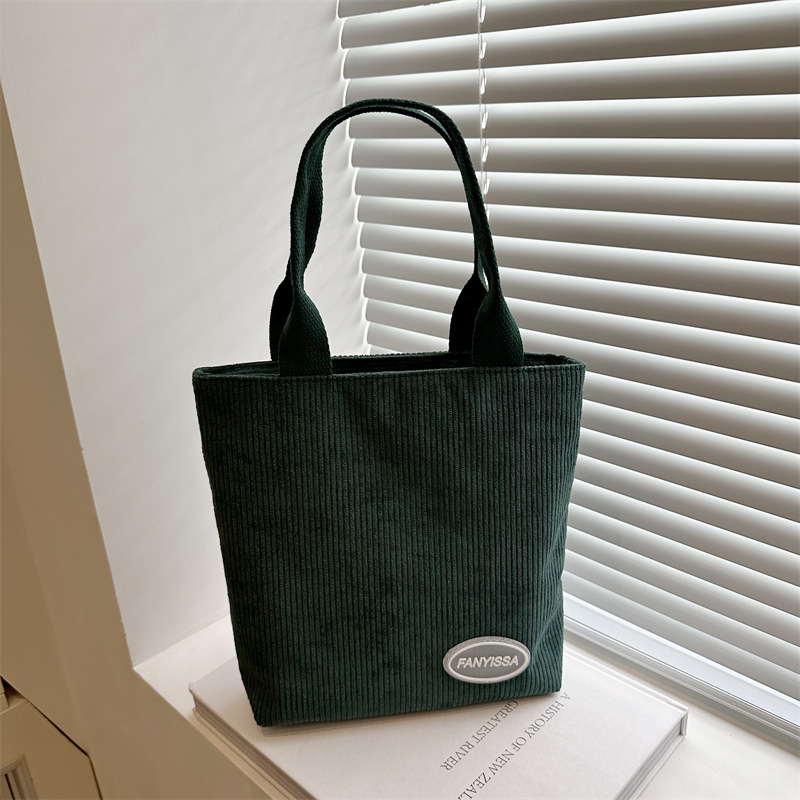 Women's corduroy 2025 new bucket bag, Korean style fashionable hand-held shoulder bag, simple and versatile crossbody bag full figure