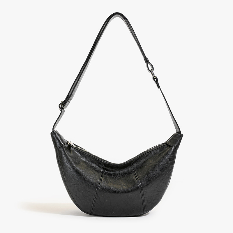 A large-capacity retro dumpling bag for women, a new 2025 trendy and laid-back style single-shoulder bag, a niche commuting crossbody horn bag Item Picture