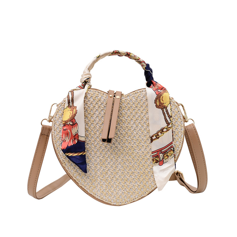 New cross-border woven bags for women: A fresh and cute girl's ribbon hand-held crossbody single-shoulder heart-shaped beach bag Item Picture