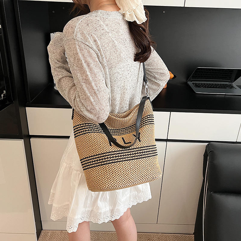 2025 Summer new style patchwork hand-woven letter straw bucket bag for women, fashionable seaside vacation single-shoulder crossbody bag Specification drawing