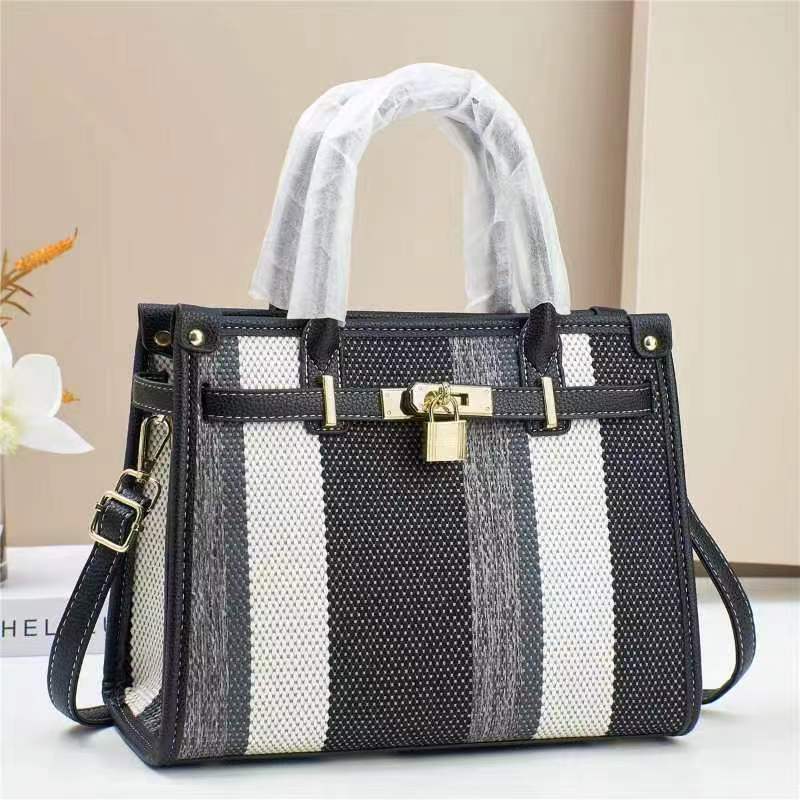 Fabric-textured women's 2024 new commuter Tote women's bag, large capacity, fashionable crossbody single-shoulder bag, elegant mom bag full figure