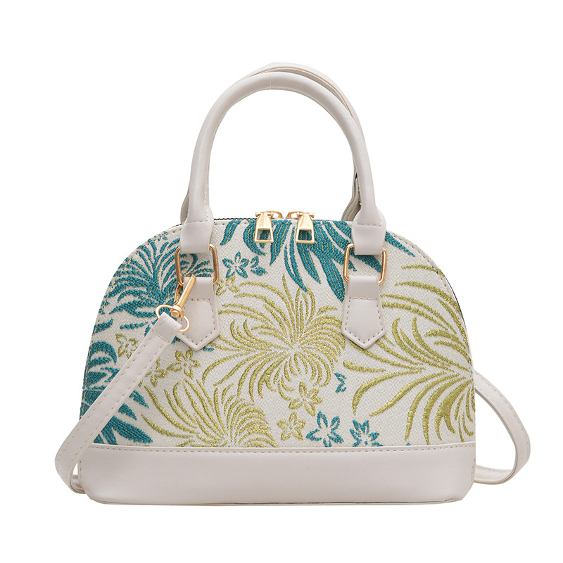 A fashionable and high-quality hand-held shell bag, a new contrasting color embroidered single-shoulder crossbody bag for women's summer, a casual and simple commuting bag Item Picture