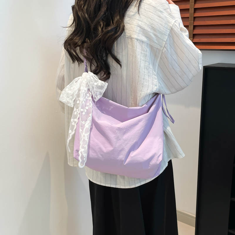 Large-capacity versatile tote bag for women, new spring/Summer 2025 canvas bag for commuting, simple solid color single-shoulder crossbody bag full figure