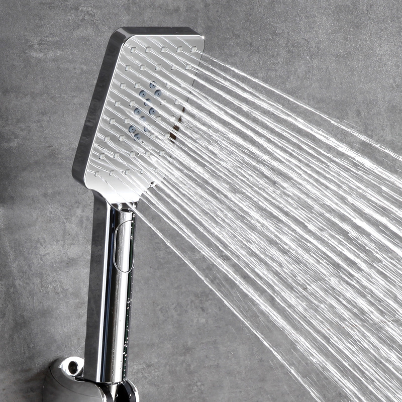 The shower head is thick, with a large water outlet hole. The water heater is equipped with a hose. It is a household shower head for bathing and a handheld shower head full figure