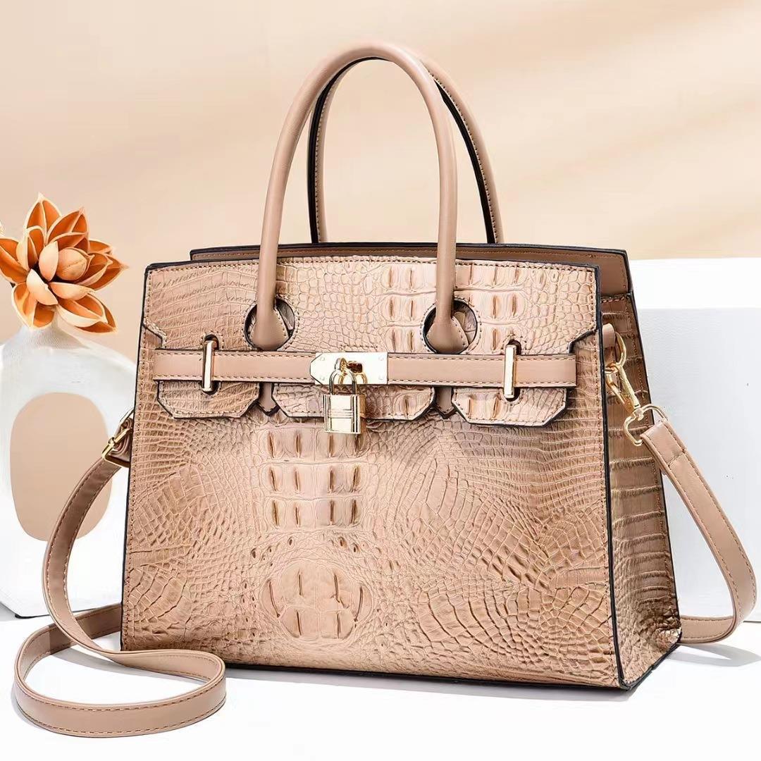 The 2022 new cross-border fashion large-capacity crocodile pattern handbag for middle-aged women details Picture