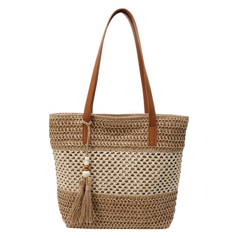 Summer stylish and hollowed-out hand-held straw woven bag 2025 new style versatile beach vacation single-shoulder woven bucket bag Item Picture