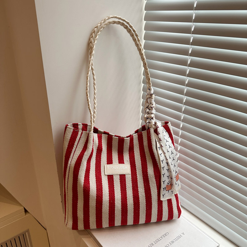 A niche, retro, artistic, simple and fresh striped casual, fashionable and stylish large-capacity single-shoulder tote women's bag full figure
