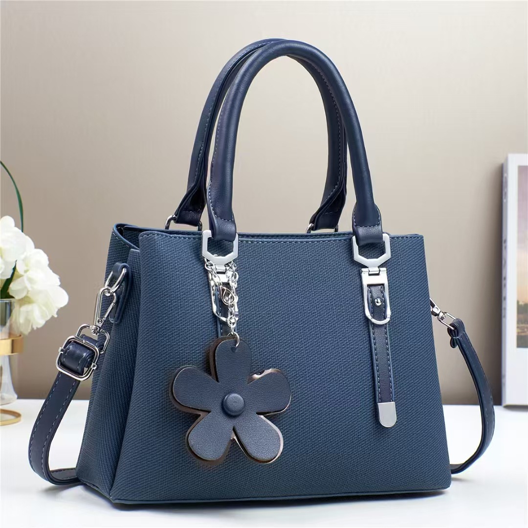 The new handbag is fashionable, elegant, simple and stylish. It has a large capacity and exquisite accessories. It is a single-shoulder crossbody women's bag for cross-border shipping Application Scenario