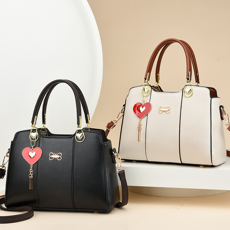 This is a new 2023 handbag for women, featuring a high-end texture, large capacity and fashionable design. It is a single-shoulder crossbody bag for middle-aged mothers Specification drawing